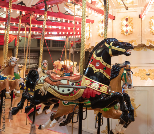 Historic carousel from early 20th century gifts fun and joy to modern people.