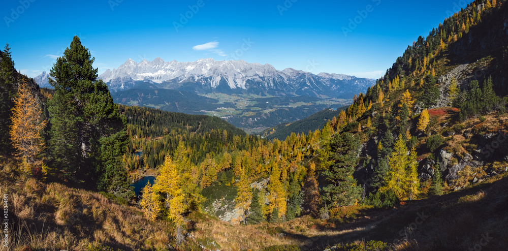 Calm autumn Alps mountain lake with clear transparent water and reflections. Untersee lake, Reiteralm, Steiermark, Austria. Calm autumn Alps mountain lake with clear transparent water and reflections. Untersee lake, Reiteralm, Steiermark, Austria.
