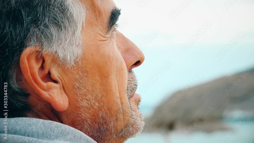 Pensive confident mature man looking up the sky.Hopes, Future Pensive confident mature man looking up the sky.Hopes, Future