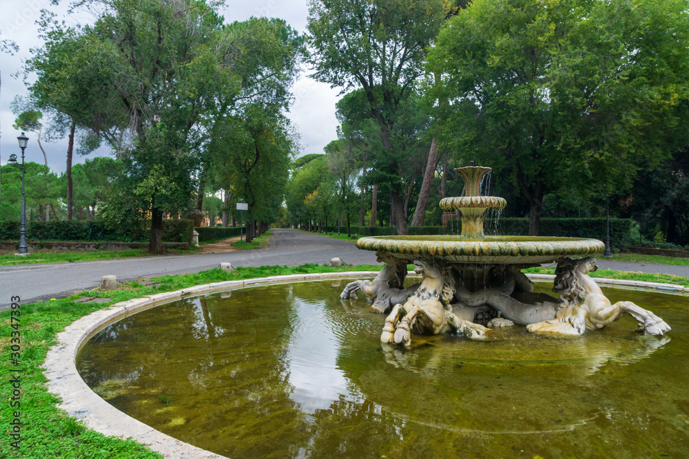 Obraz premium the public park Villa Borghese gardens with the Fountain of the Sea Horses (Fontana dei Cavalli Marini) in Rome, Italy