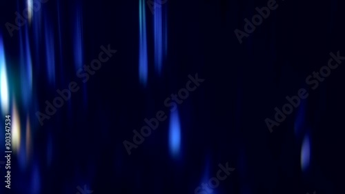 Sparks motion background. Glowing lights. Blue glaring flecks effect overlay.