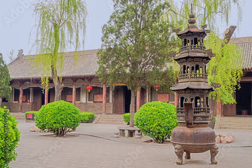 фотографія Courtyard in the Confucian temple complex with censer in the old town of Pingyao