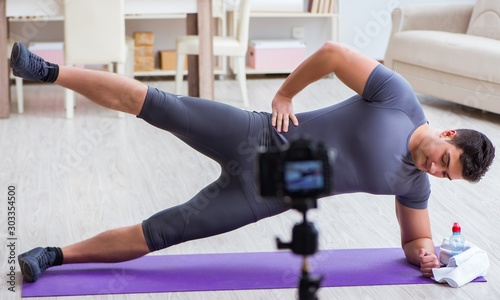 Sports and health blogger recording video in sport concept