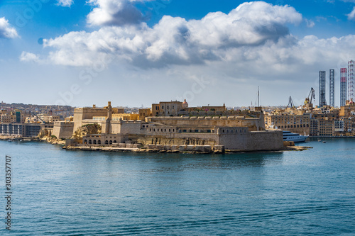 Fototapeta Naklejka Na Ścianę i Meble -  A large cloud over Fort St Angelo, Birgu, Malta.