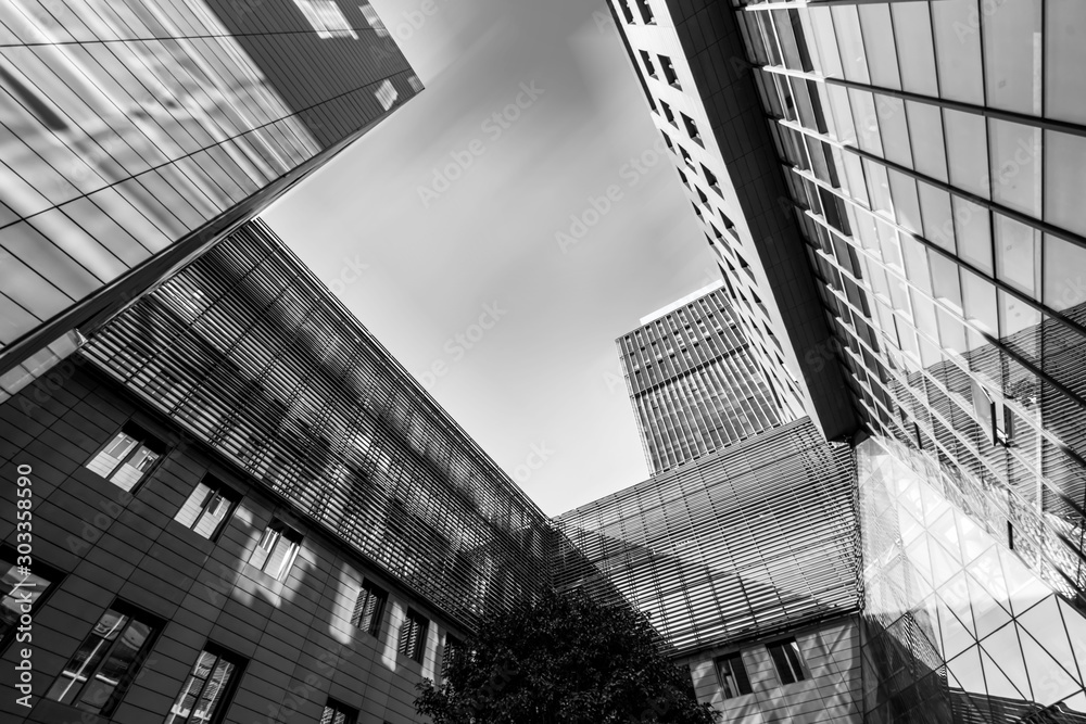 Fototapeta premium Assault city modern architecture office building
