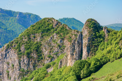 beautiful mountain landscape. sunny springtime scenery with cliffs of Cheile Manastirii in alba country of romania photo