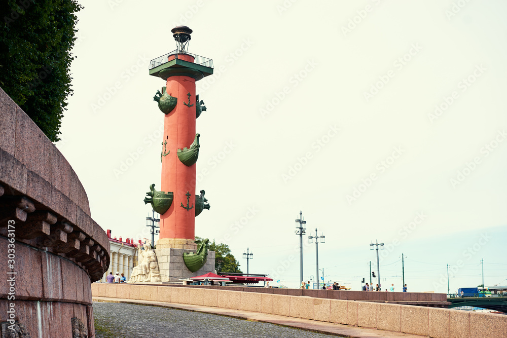 One of the famous Petersburg rostral, red, decorated lighthouse. One of the famous Petersburg rostral, red, decorated lighthouse.