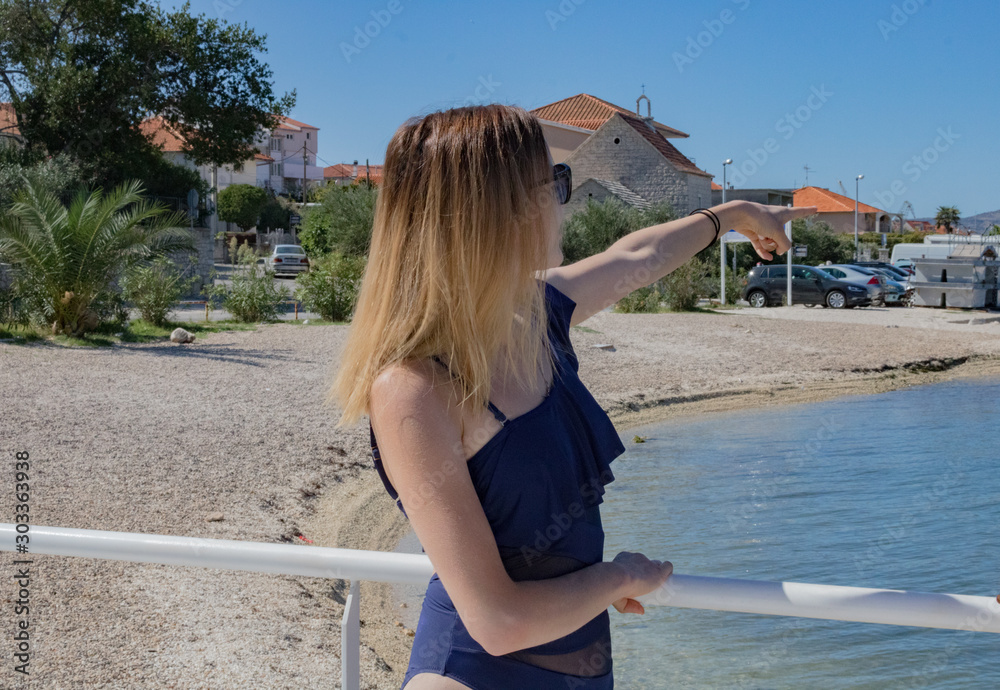 Naklejka premium Woman on the beach. 