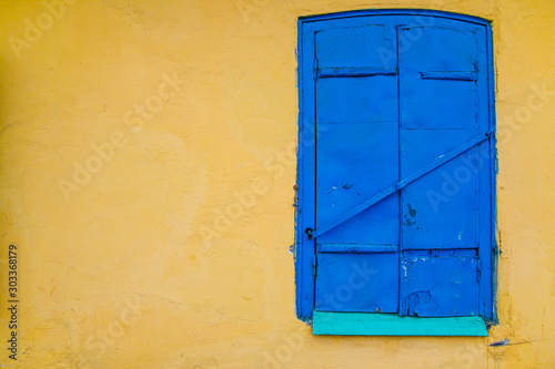 blue window on a wall