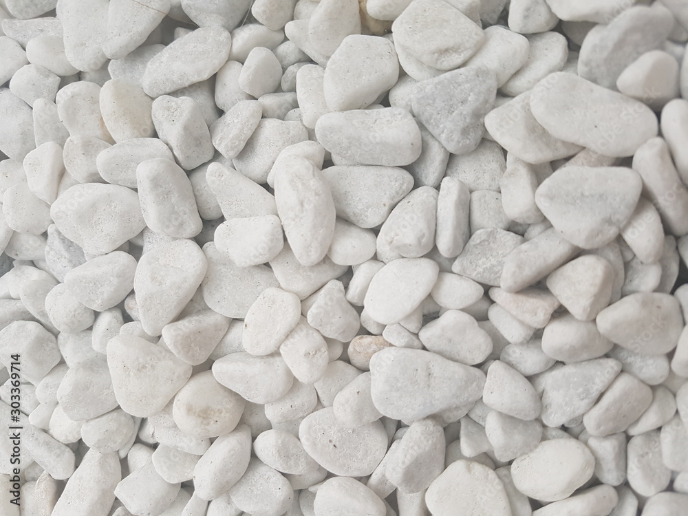 white pebbles on the floor as a background white pebbles on the floor as a background