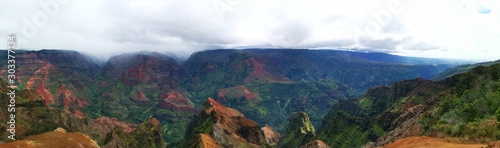 Panoramic waimea canyon kauai hawaii landscape with mountains and clouds