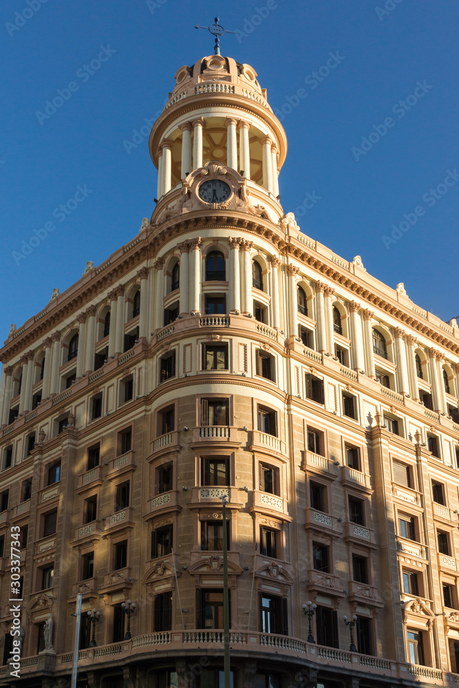 Sunset view of Building at Gran Vía street in City of Madrid