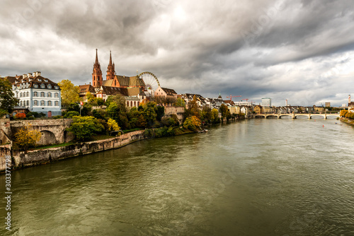 Old city center of Basel with Munster cathedral and the Rhine river in Switzerland
