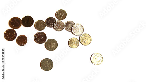Several Russian coins lie on a white isolated background. Shiny Russian metal money. Place for text.