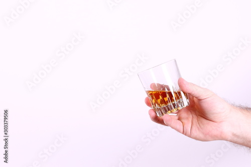 glass whisky in hand
