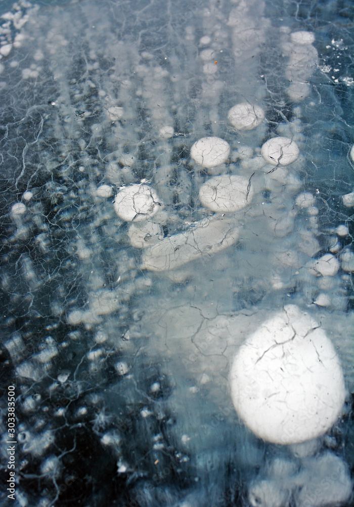 Φωτογραφία Air bubbles trapped in frozen water at Lake Baikal, Siberia, Russia