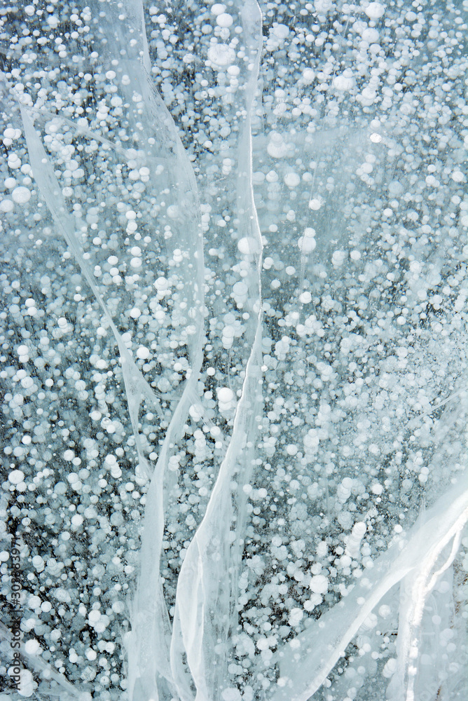 Air bubbles trapped in frozen water at Lake Baikal, Siberia, Russia Air bubbles trapped in frozen water at Lake Baikal, Siberia, Russia