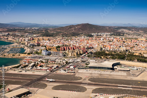 Gibraltar airport runway and La Linea de la Concepcion in Spain. View from the top of the rock of Gibraltar.