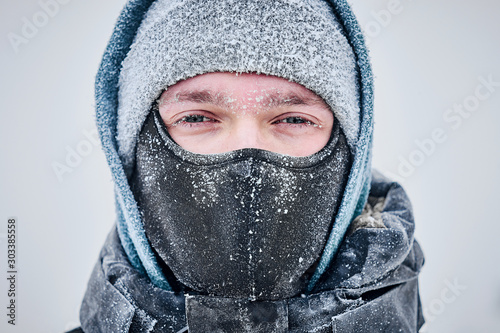 MAn's face covered with frost in winter
