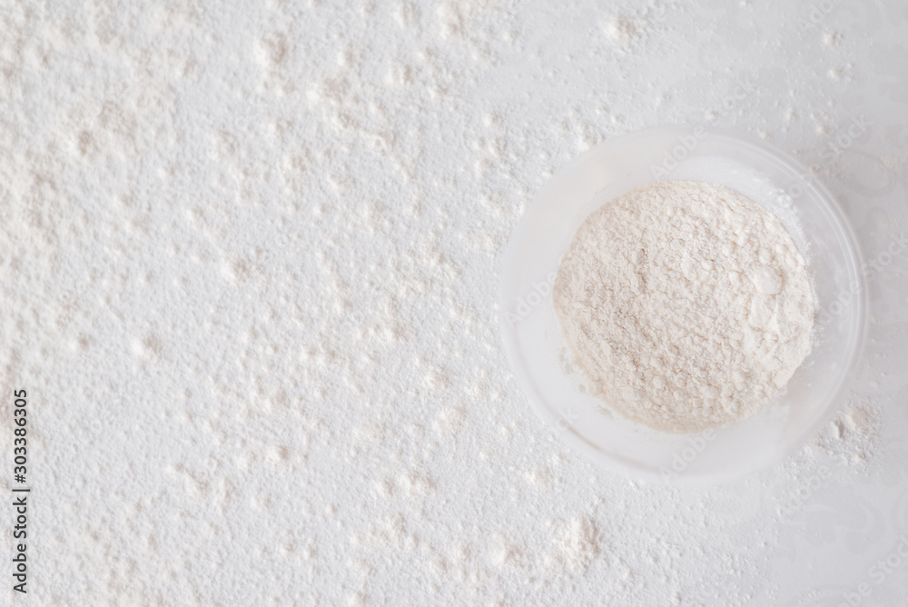 Top view of Circle wood bowl with wheat flour isolated on white background. Top view of Circle wood bowl with wheat flour isolated on white background.