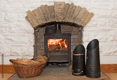Obraz na plátne Thanks giving warmth and comfort; heating a home with traditional methods