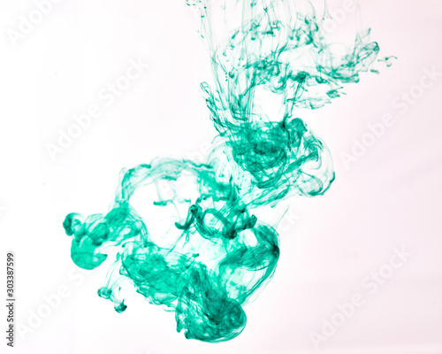 The colorful ink into the water while in motion, Abstract, background, Wallpaper, Concept art.