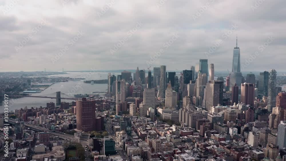 Flying above Manhattan buildings, New York skyline with skyscrapers