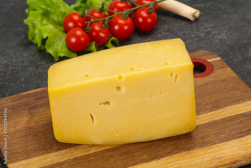 Hard yellow tasty cheese brick Hard yellow tasty cheese brick