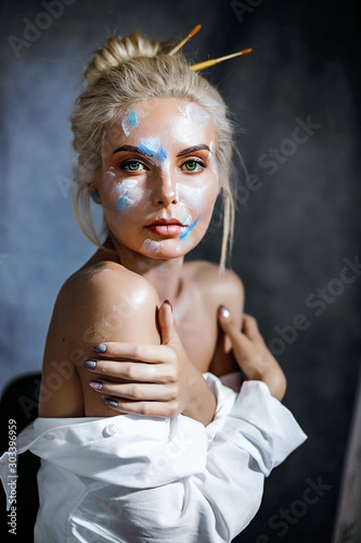 Creative fashion beauty portrait of beautiful young blonde woman with hairstyle. © Natallia