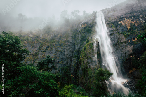 waterfall in the mountains - Scene of amazing Diyaluma waterfall in Sri Lanka