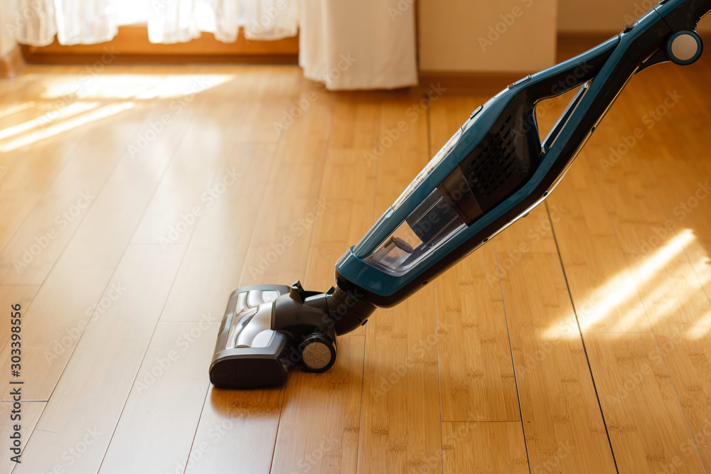Ταπετσαρία Bamboo flooring cleaning with a vertical vacuum cleaner