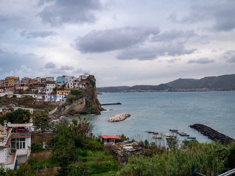 a beautiful panorama of Bacoli with beach of the hillock (Spiaggia del Poggio). Campi Flegrei regional park (The Phlegraean Fields), Campania, Naples, Italy a beautiful panorama of Bacoli with beach of the hillock (Spiaggia del Poggio). Campi Flegrei regional park (The Phlegraean Fields), Campania, Naples, Italy