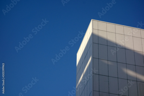 Scenery of multistory parking lot with blue sky