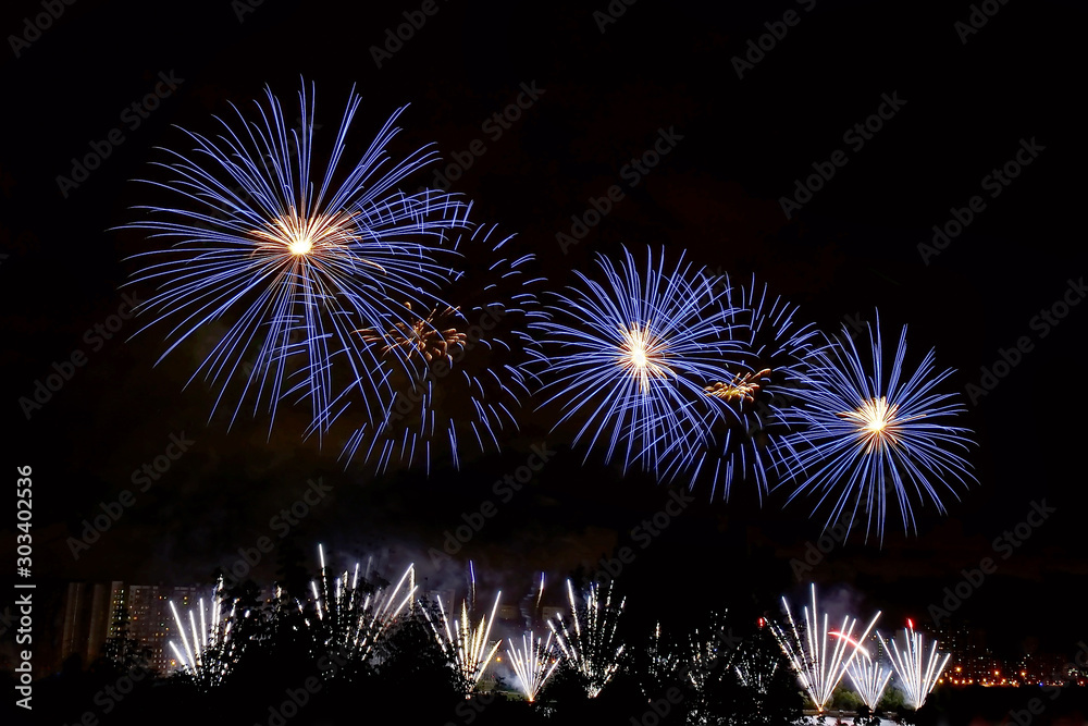 Flashes of blue and white fireworks