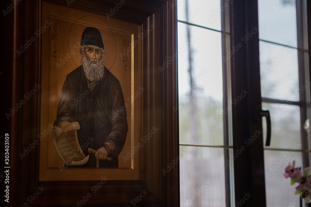 Orthodox church, icons of saints, gilding, burning candles. Orthodox church, icons of saints, gilding, burning candles.