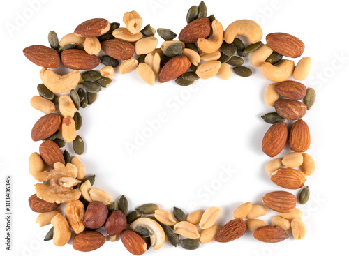 Frame from different nuts on white background, top view. Walnut, hazelnut, peanut, cashew, almonds and pistachios