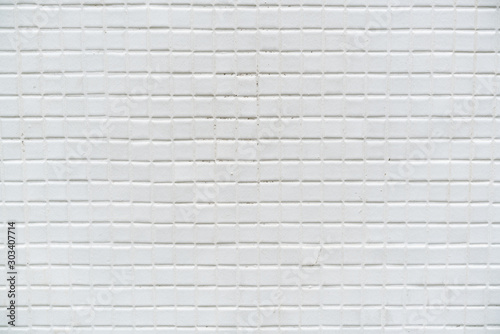 Old white tile wall background