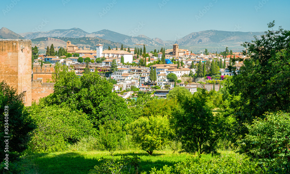 Panoramic sight with the Alhambra Palace and the Albaicin district in Granada. Andalusia, Spain.