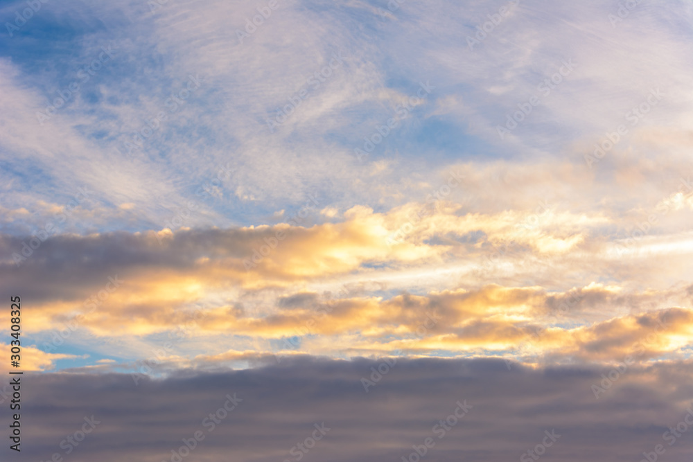 Beautiful sky at sunset. Bright clouds. Sky background.