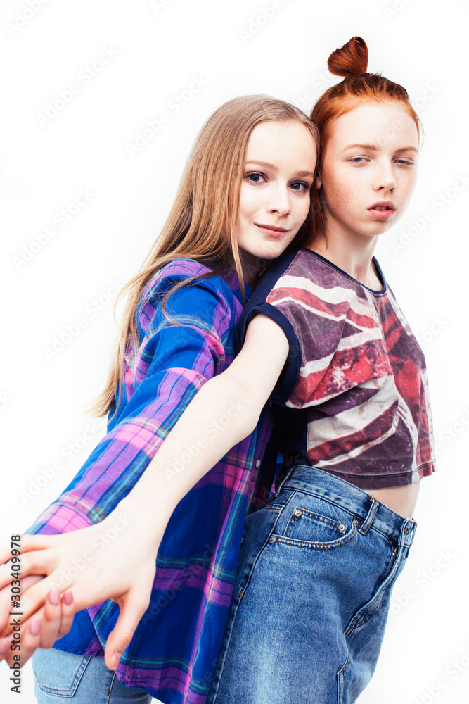 best friends teenage girls together having fun, posing emotional on white background, besties happy smiling, lifestyle people concept close up.