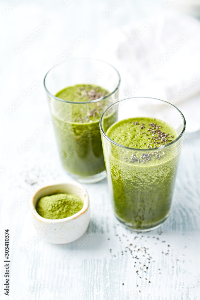 Green smoothie with baby spinach, apple, banana and barley grass. Topped with chia seeds Green smoothie with baby spinach, apple, banana and barley grass. Topped with chia seeds