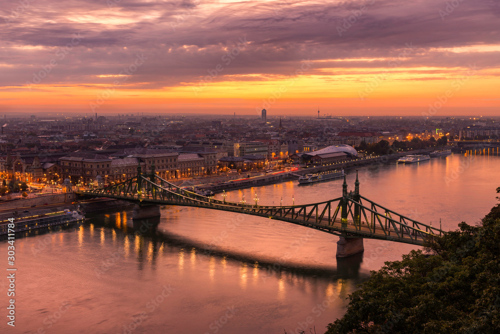The Liberty Bridge of Budapest from Gellert Hill before sunrise.