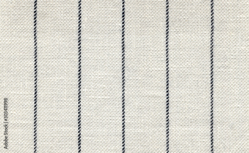 Pinstripes are thin, vertical blue stripes. White linen with vergin wool. Natural Visible weave texture. Summer. Expensive men's suit. High resolution