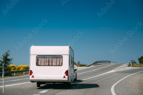White Colour Motorhome Car Goes On Motorway Road