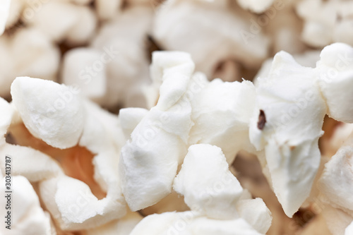 Popcorn as detailed close up photo with a selective focus.