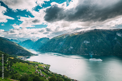 Aurland, Sogn And Fjordane Fjord, Norway. Amazing Summer Scenic View Of Sogn Og Fjordane. Ship Or Ferry Boat Liner Floating In Famous Norwegian Natural Landmark And Popular Destination In Summer Day