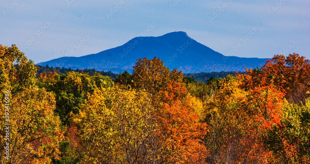 Camel's hump mountain in autumn with fall foliage colors 