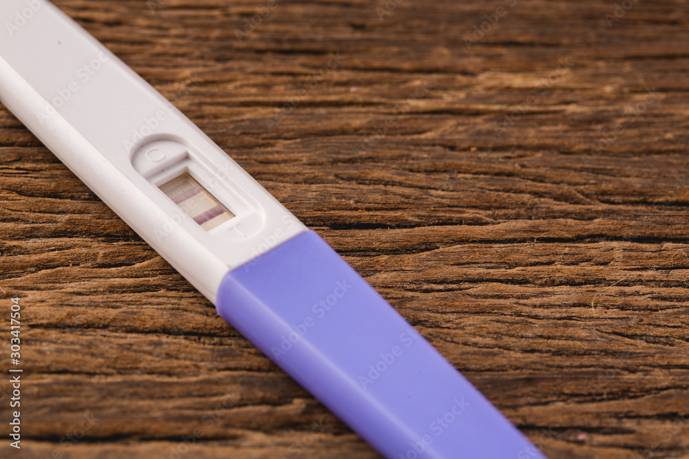 Positive pregnancy tester close up