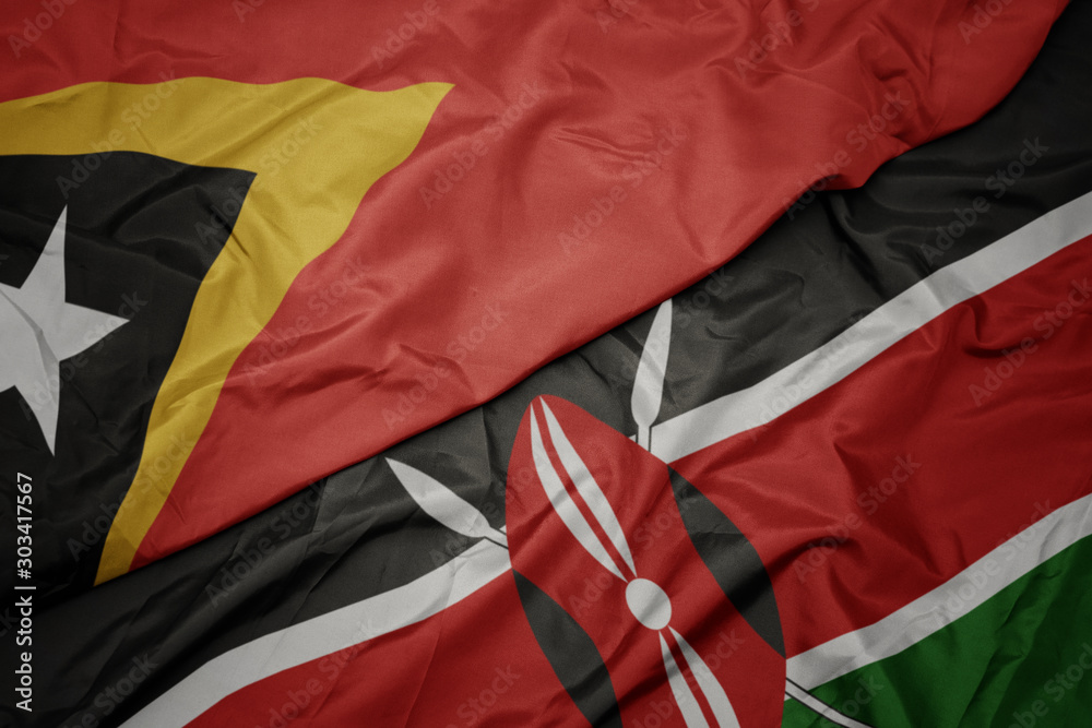waving colorful flag of kenya and national flag of east timor. waving colorful flag of kenya and national flag of east timor.