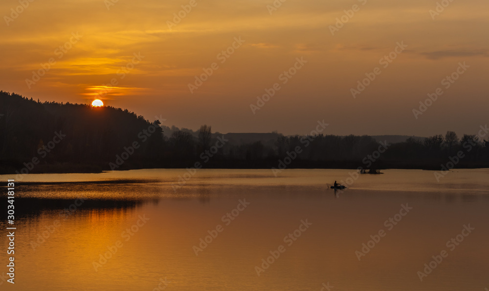 Sunset on the lake. Fishing. Fisherman. Kiev region. Ukraine.